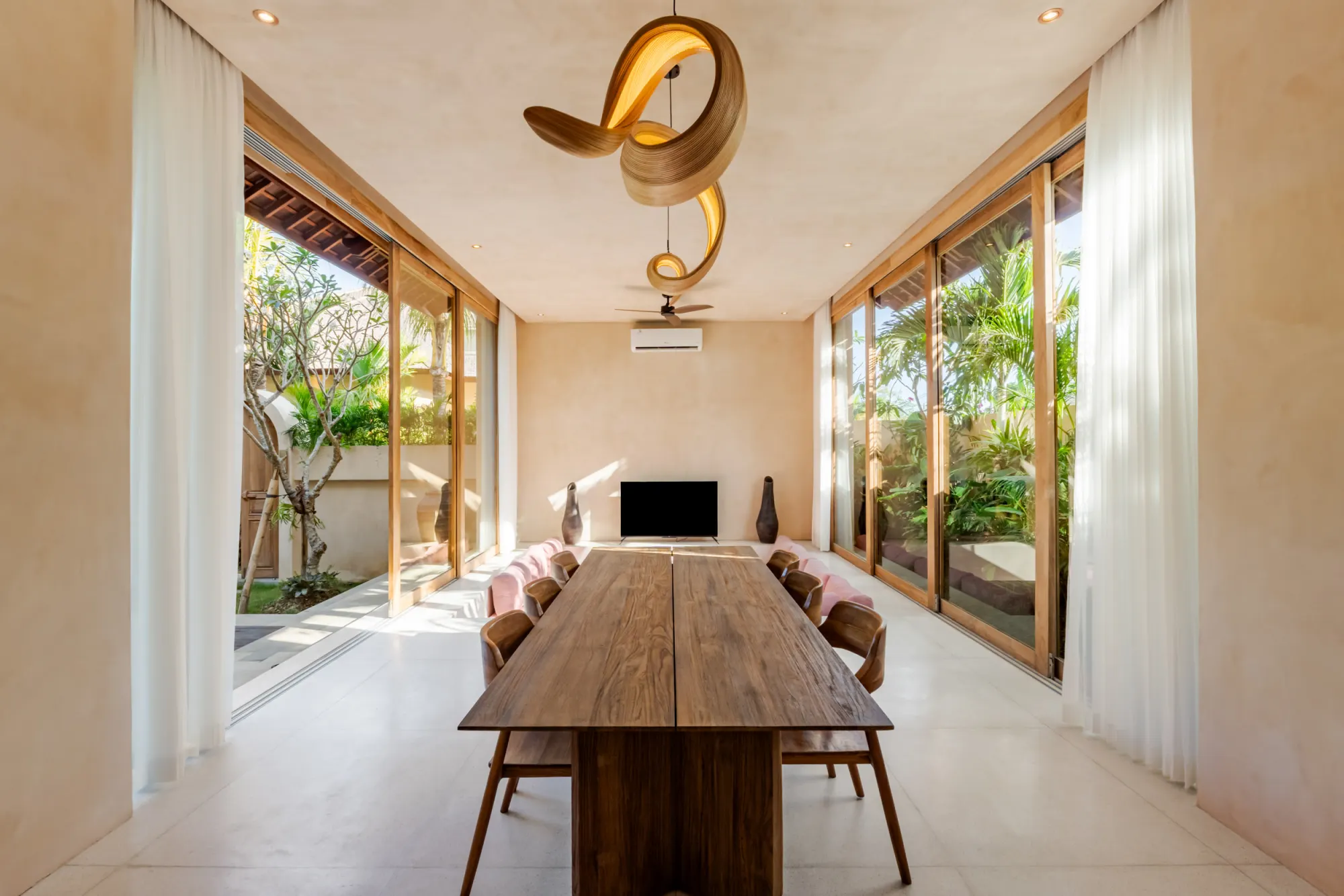 Modern dining pavilion with natural lighting and garden access