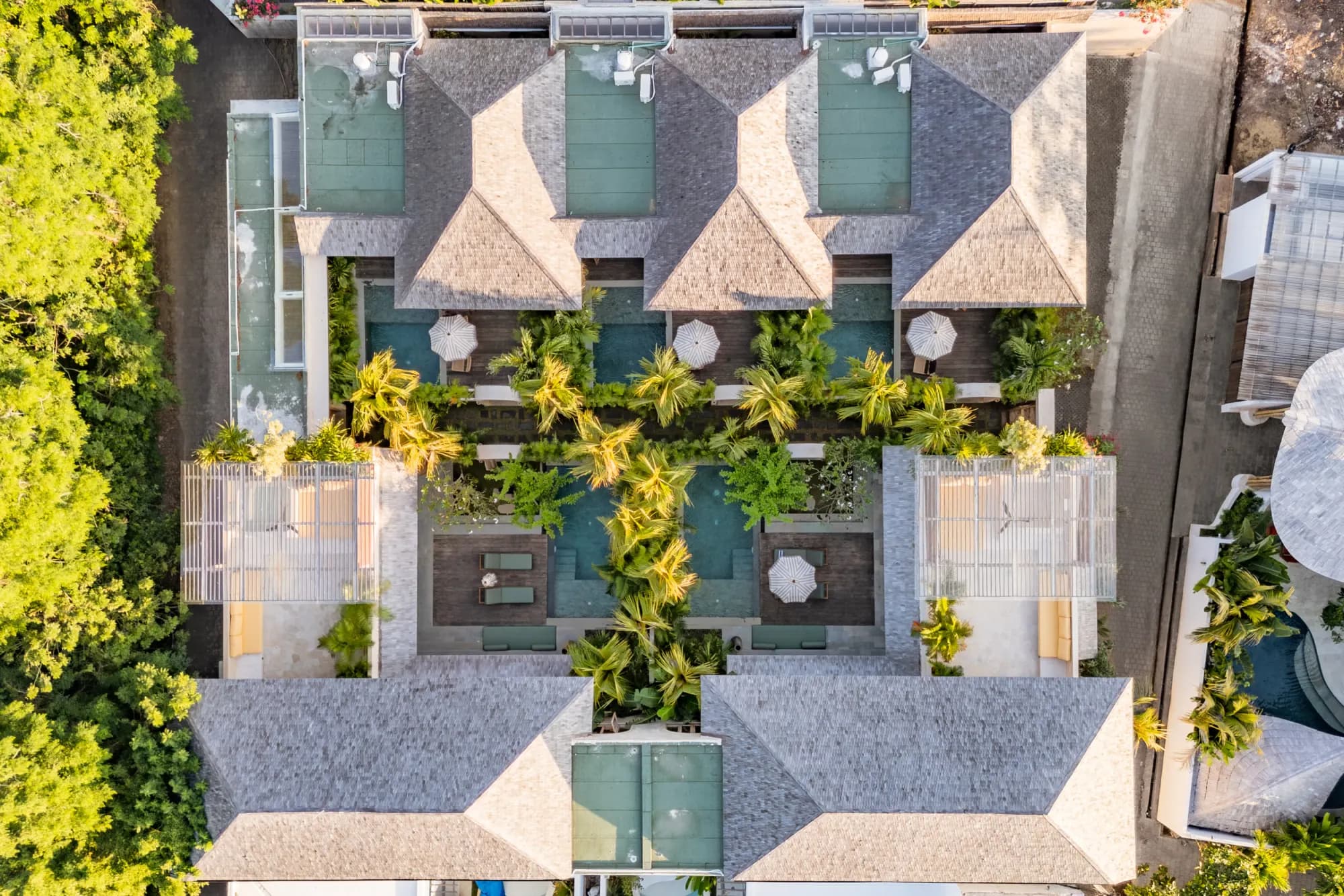 Overhead compound view with center courtyard pool and gardens