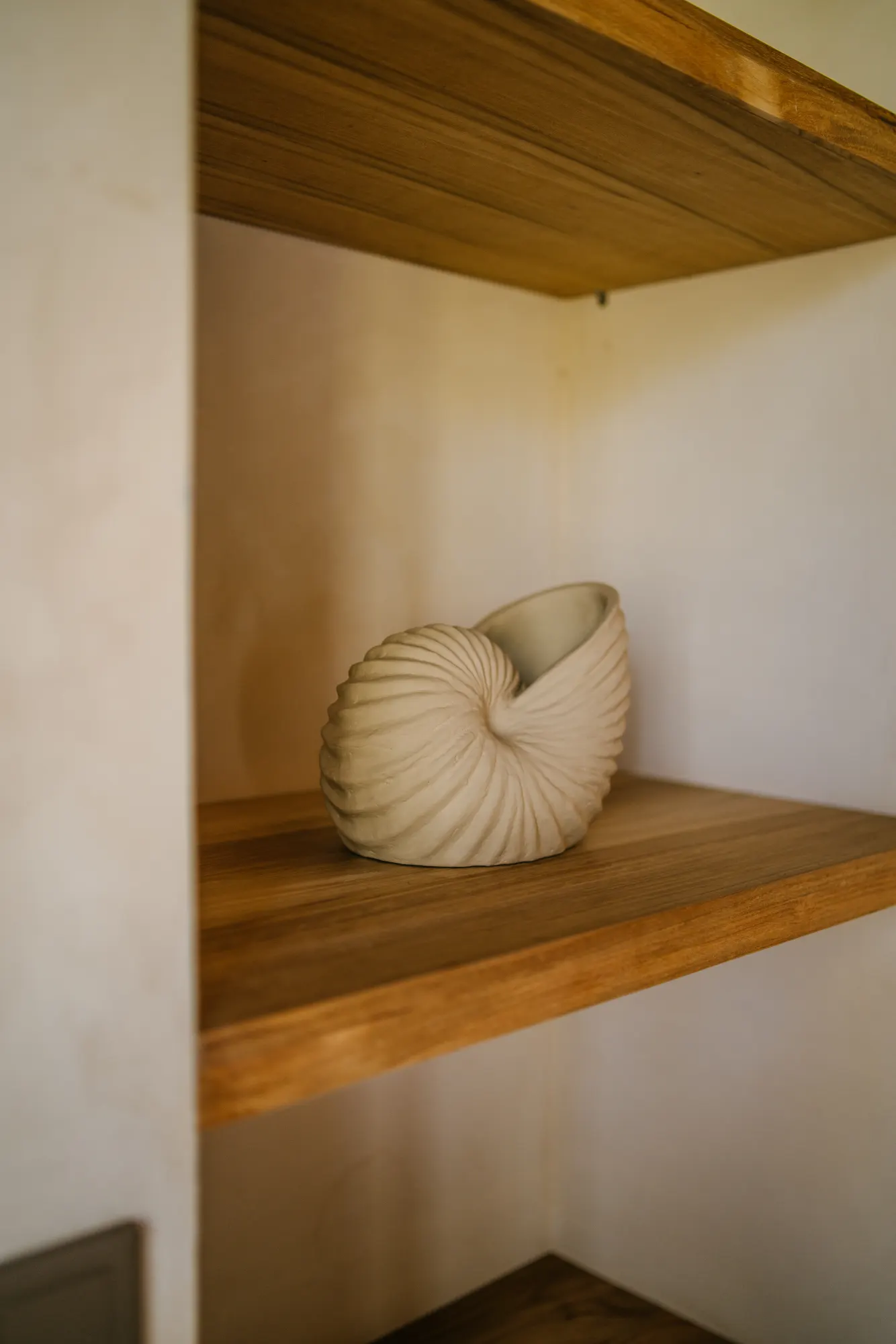 Nesting wood shelf sculpture inside home