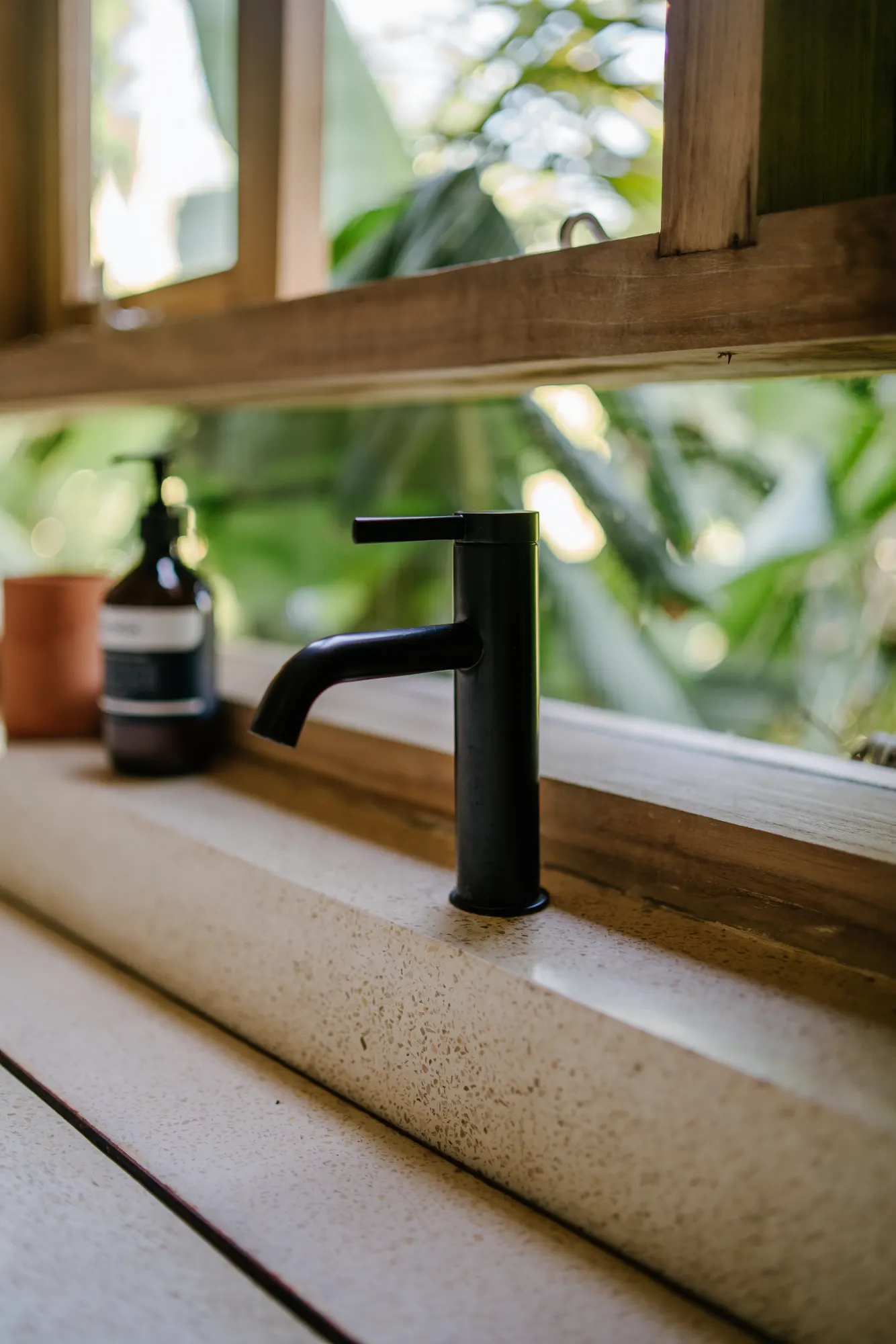 Close-up of designer faucet detail in modern bathroom