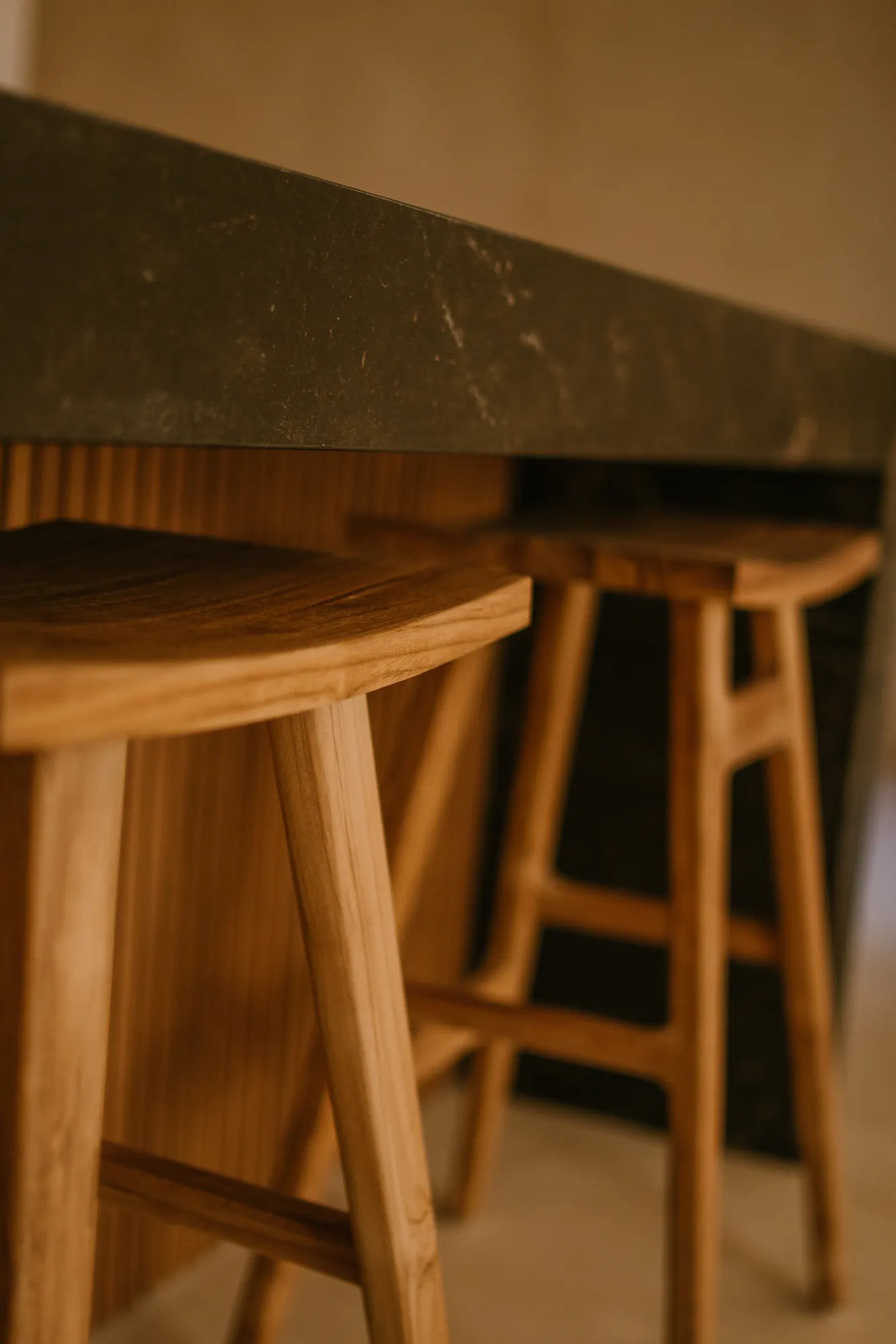 Close-up of natural wood bar stool with grain detail